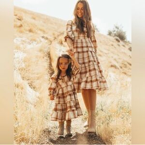 Beautiful brown and cream knee length dress from Ivy City Co.